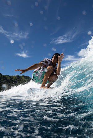 Wakesurfing on a surf style wakesurf board